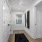 hallway showing entrances to apartment homes