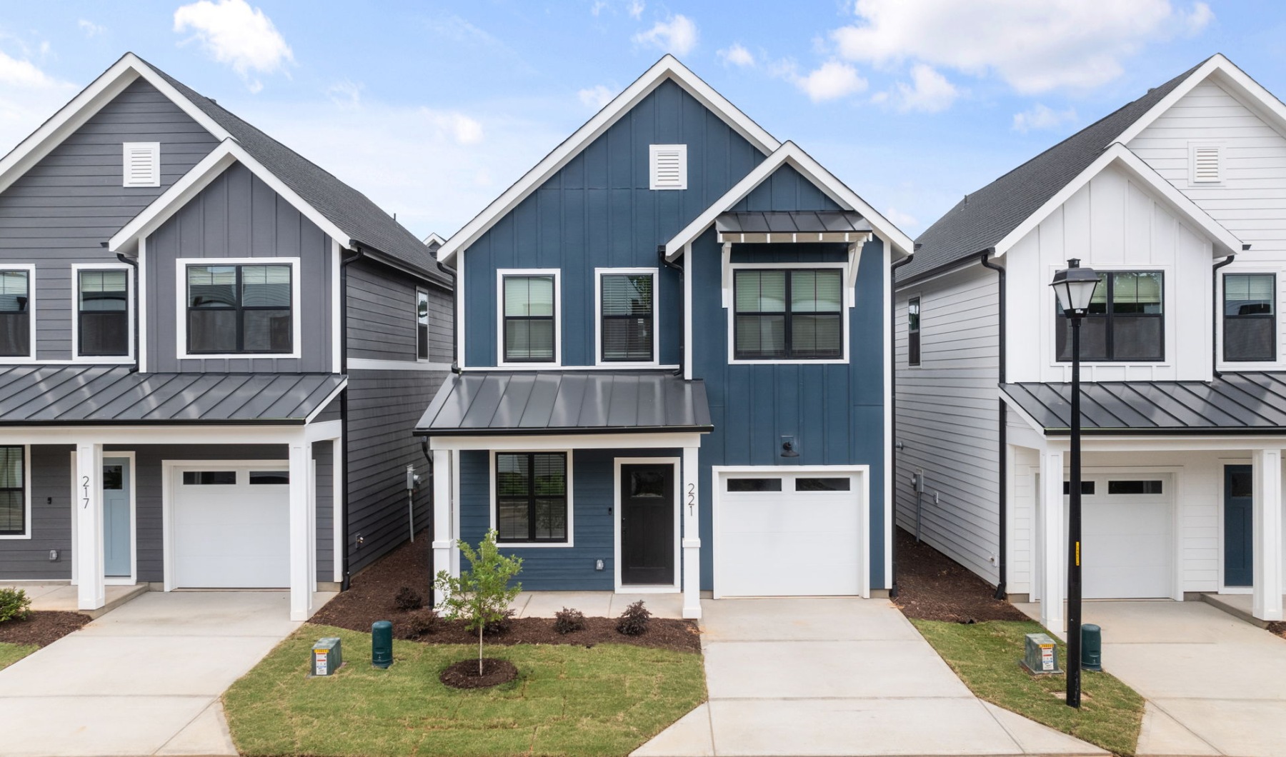 Image of homes with attached garage and private driveways